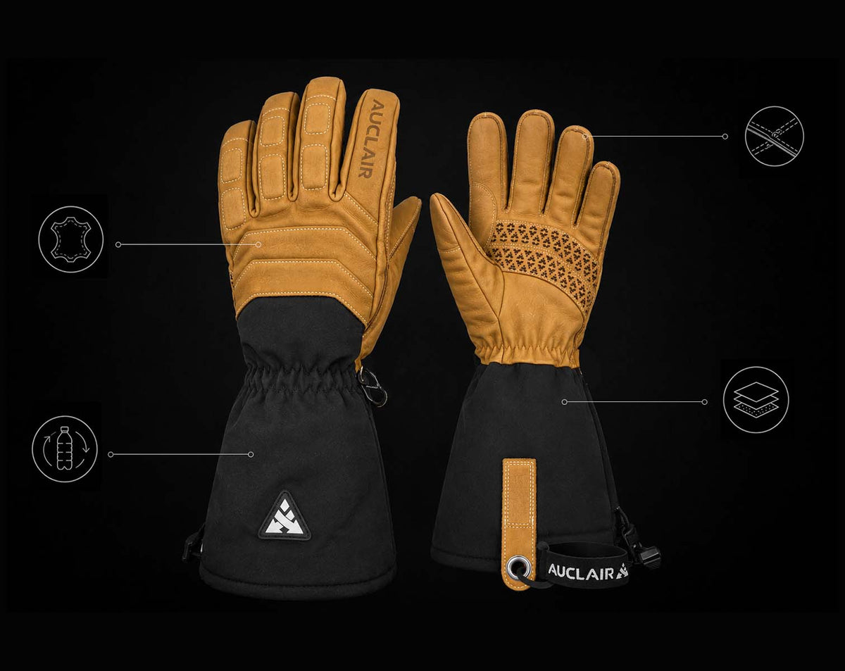 A pair of Auclair ski gloves shown against a black background with feature callout graphics. The gloves are tan and black, with the brand name 'AUCCLAIR' visible on the back of one glove and a small logo on the cuff of the other.